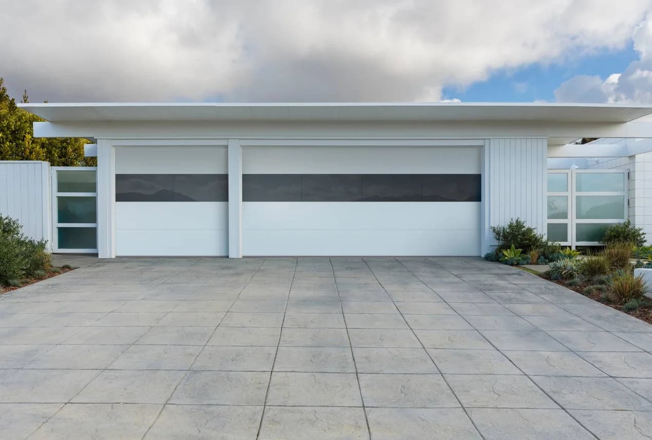 CHI sterling garage door with modern home